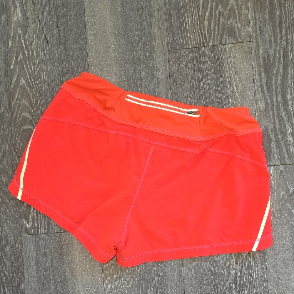Athleta Ready Set Neon Orange Running Shorts - Picture 4 of 5
